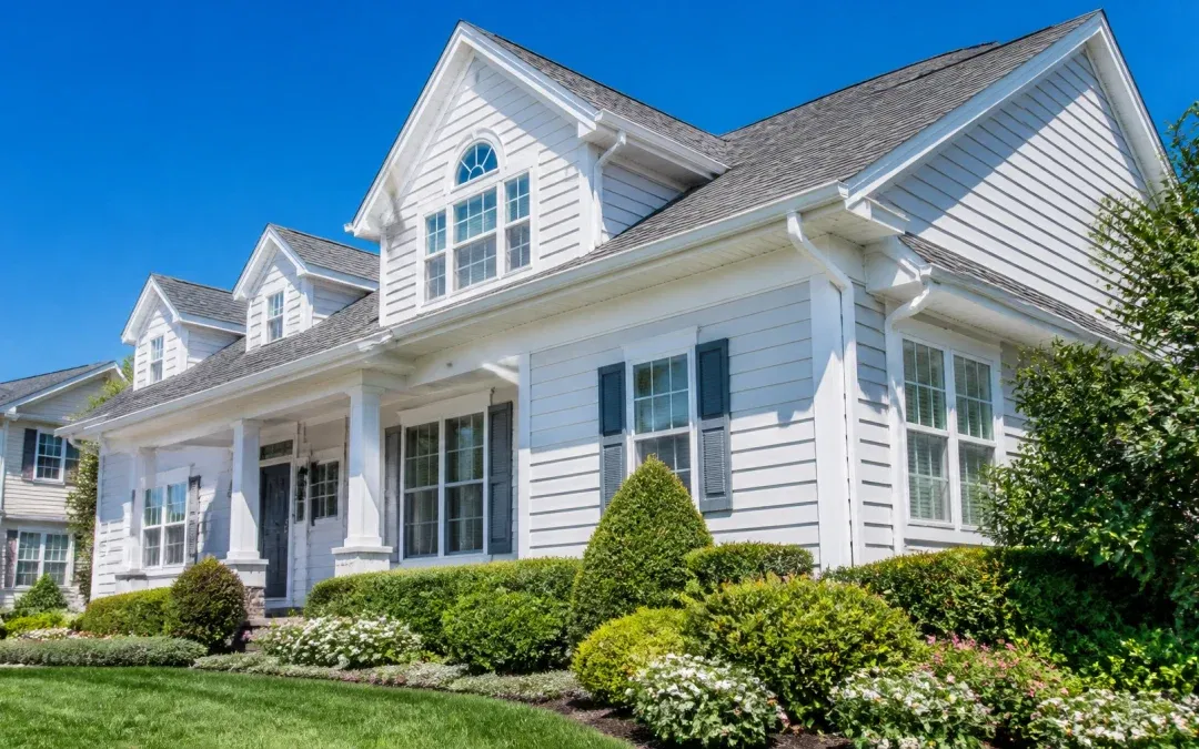 Power washing a house exterior on Long Island